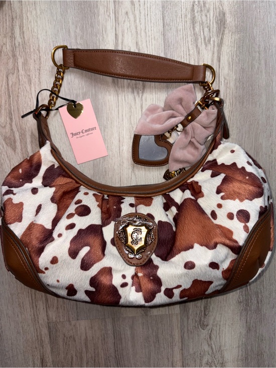 Juicy Couture Handbags - Viral Juicy Couture cow print hobo/coho